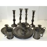 Collection of pewter including plates, tankards, candlesticks, etc