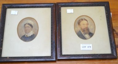A pair of 19th century water colour portraits of a lady and a gentleman