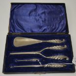 William Devenport, a cased silver handle set comprising, shoe horn, glove stretcher, glove hook and