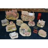 A collection of "Lilliput Lane" and other model cottages includes "Shakespeare's Birthplace"