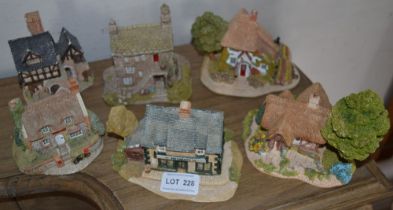 A collection of six "Lilliput Lane" cottages includes Pat Cohan's bar
