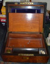 A 19th century walnut writing slope with fitted inkwell