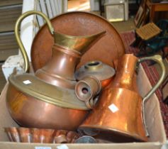 A box containing a selection of copper ware