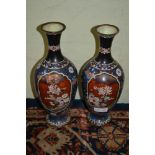 A pair of Chinese cloisonné vases with floral decoration a/f