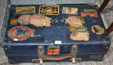 A well travelled blue suitcase containing collectables various