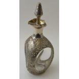 A Chinese silver mounted Dimple decanter, having three pouring lips, with pierced and embossed bambo
