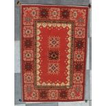 A Qashqai Soumak rug, red ground and deep bordered, 1.8m x 1.2m