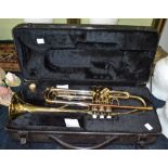 A "Volt" brass trumpet in carry case