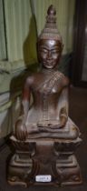 Cast metal bronzed Buddah seated upon a lotus 43cm high