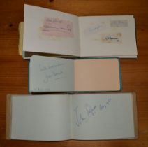 Three autograph books to include Laurel & Hardy