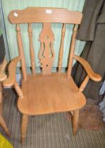 A pair of Beech kitchen armchairs