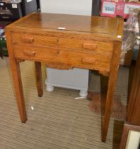 An Art Deco oak canteen of two drawers containing a large set of Sheffield A1 plate