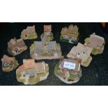 A collection of ten "Lilliput Lane" cottages includes the village school