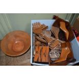 Box of carved woodenwares to include a probable Roland Ward napkin ring set