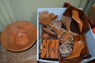 Box of carved woodenwares to include a probable Roland Ward napkin ring set