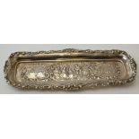 Henry Matthews, a Victorian silver pen tray, embossed decoration of a minstrel serenading two ladies