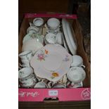 A box of assorted ceramic wares, includes various pattern cups and saucers
