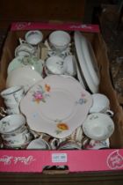 A box of assorted ceramic wares, includes various pattern cups and saucers