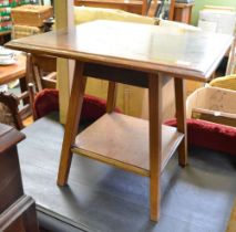 A mahogany and satin wood square topped low table with solid under tier (cut down)