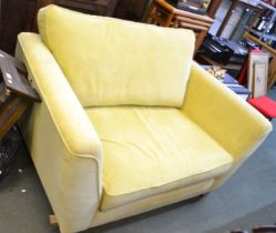 A Love Seat upholstered in yellow