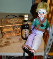 Musical jewellery box commemorative beer bottle and a musical clown