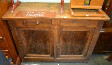 A 19th century oak two drawer sideboard