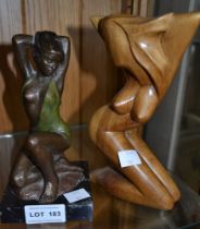 A semi-nude bronze sculpture of a seated lady initialled AP, together with a similar wooden example