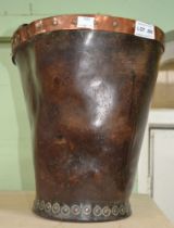 A Victorian leather studded bucket with copper banded top rim and a strap handle