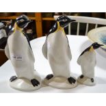 Three Poole Pottery standing penguins