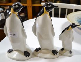 Three Poole Pottery standing penguins