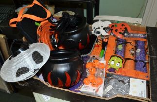 A box containing a selection of Halloween themed decorations and accessories
