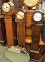 Three Grandmother wooden case clocks