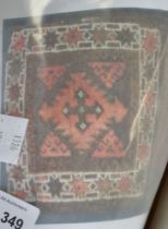 An Eastern rug, bordered