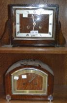 Two wood cased mantel clocks