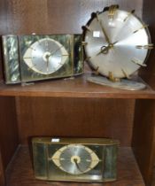 Two 20th century brass mantel clocks by Metamec, together with a Europa Elamatic example