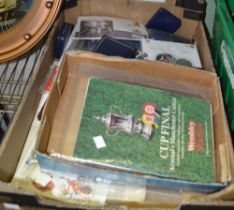 A box containing commemorative coins, football ephemera, etc.