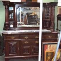 A large mahogany mirror backed sideboard with twin columns