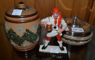 A "Wade" Brewmaster figure 13 cm high, a Doulton Lambeth tobacco jar and