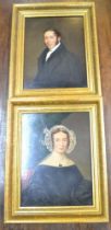 A pair of 19th century oil on board portraits in later distressed gilt frames