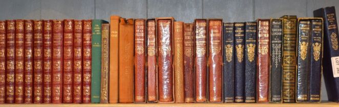 A collection of red leather bound Dickens novels, published by Thomas Nelson & Sons 1902, together