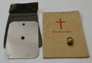 A crow foot military signalling mirror, marked GBB 1945, within a green fabric sleeve, ex Far East B