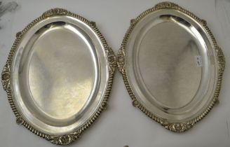 Daniel & Charles Houle, a pair of mid 19th century oval silver serving platters, with gadrooned acan