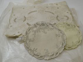 A collection of embroidery Anglaise placemats, various shapes & sizes