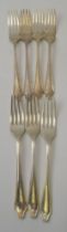 Cooper Brothers & Sons Ltd. A set of four silver dessert forks, Sheffield 1966, together with a set