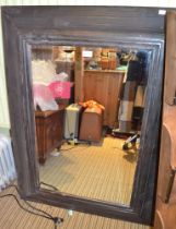A large painted soft-wood framed wall mirror