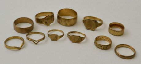 A collection of eleven 9ct gold rings, includes wedding bands and signet rings, combined weight 39g