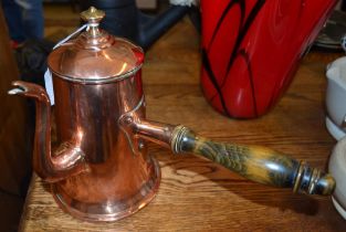 A late 18th century copper coffee / chocolate pot, with wooden side pouring handle, dovetails constr