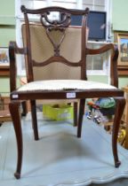 Mahogany coloured open armchair