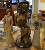 Three female figurines