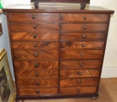 A 19th century mahogany finished 18 drawer chest on squashed bun feet 95 x 90 cm